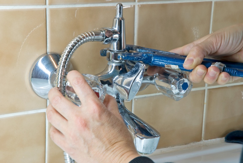 Shower being installed in a Acton bathroom
